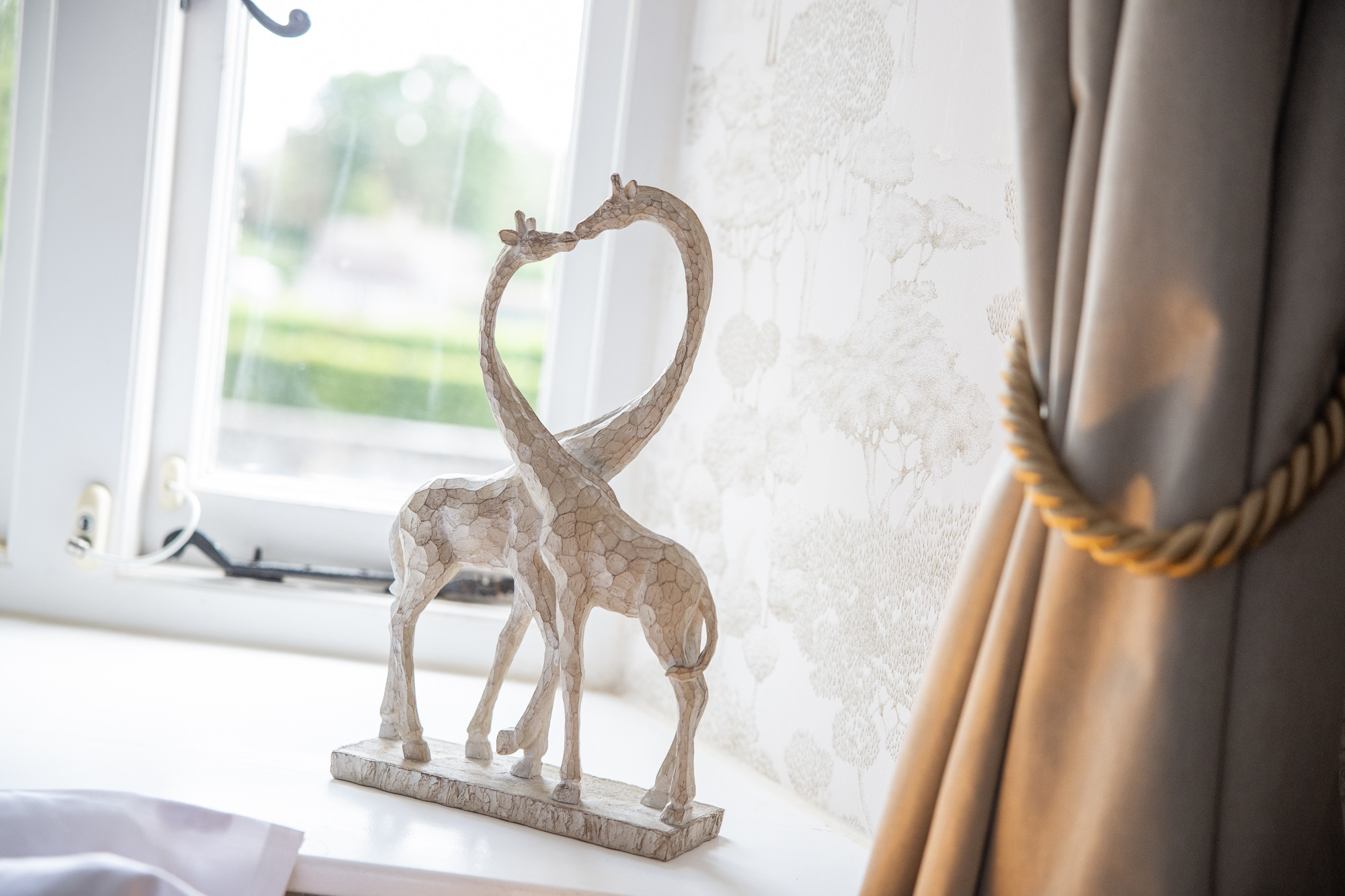 Room detail with animal portrait wallpaper