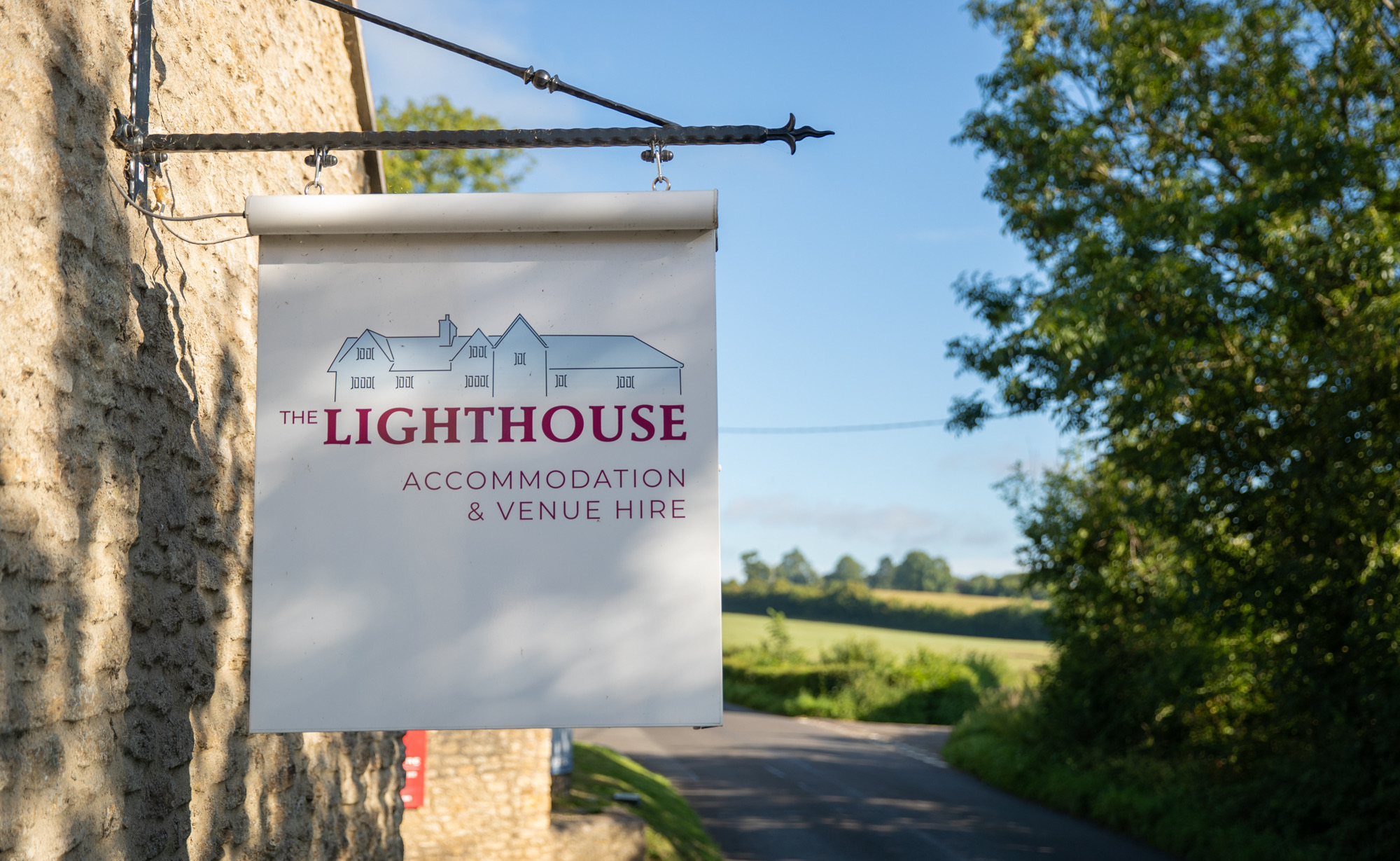 Lighthouse accommodation and venue hire sign